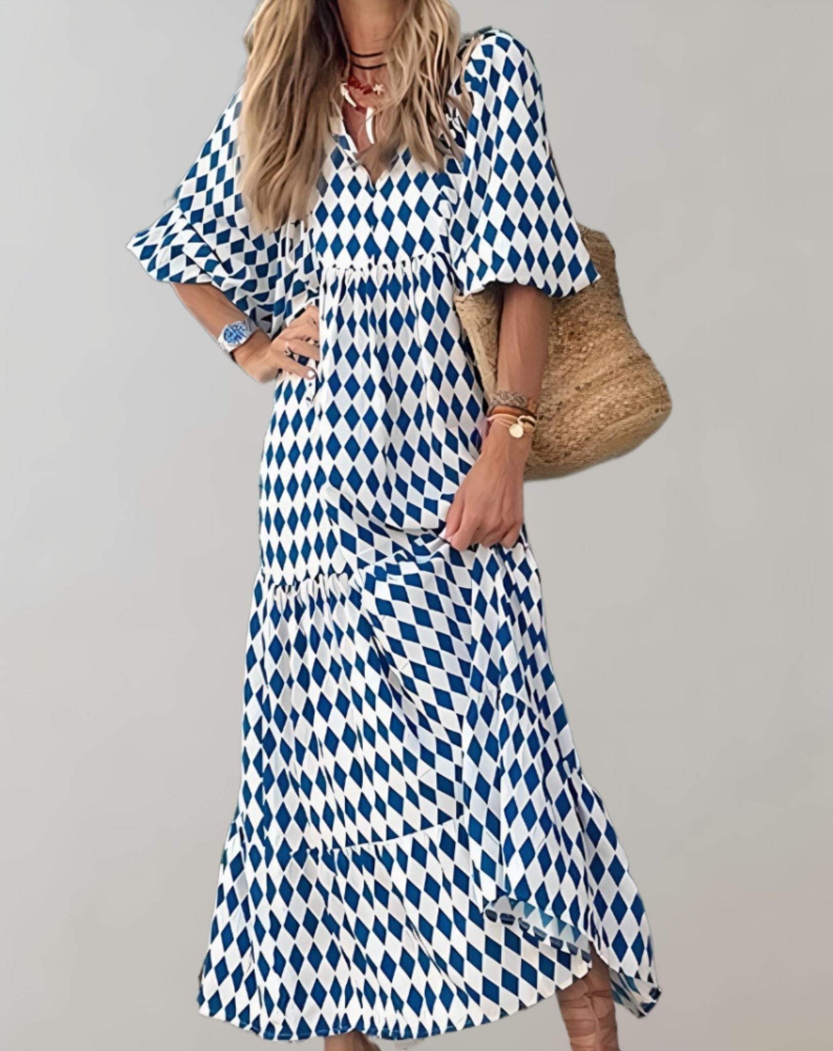 Dana -  Lockeres langes Kleid mit halblangen Puffärmeln und zufälligem Design Kleid
