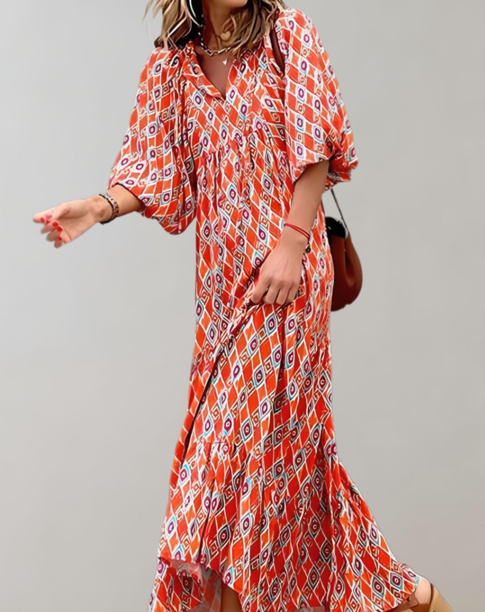 Dana -  Lockeres langes Kleid mit halblangen Puffärmeln und zufälligem Design Kleid