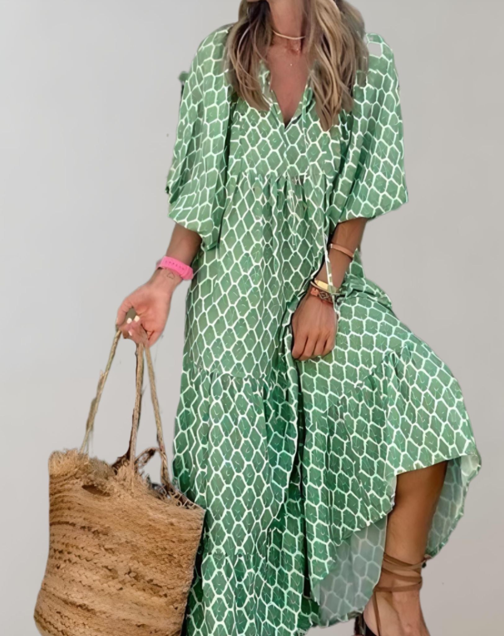 Dana -  Lockeres langes Kleid mit halblangen Puffärmeln und zufälligem Design Kleid