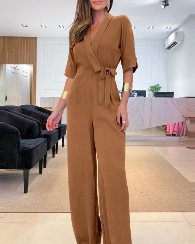 Eleganter Damen Jumpsuit mit weitem Bein, Schalkragen und verspieltem Schleifendetail