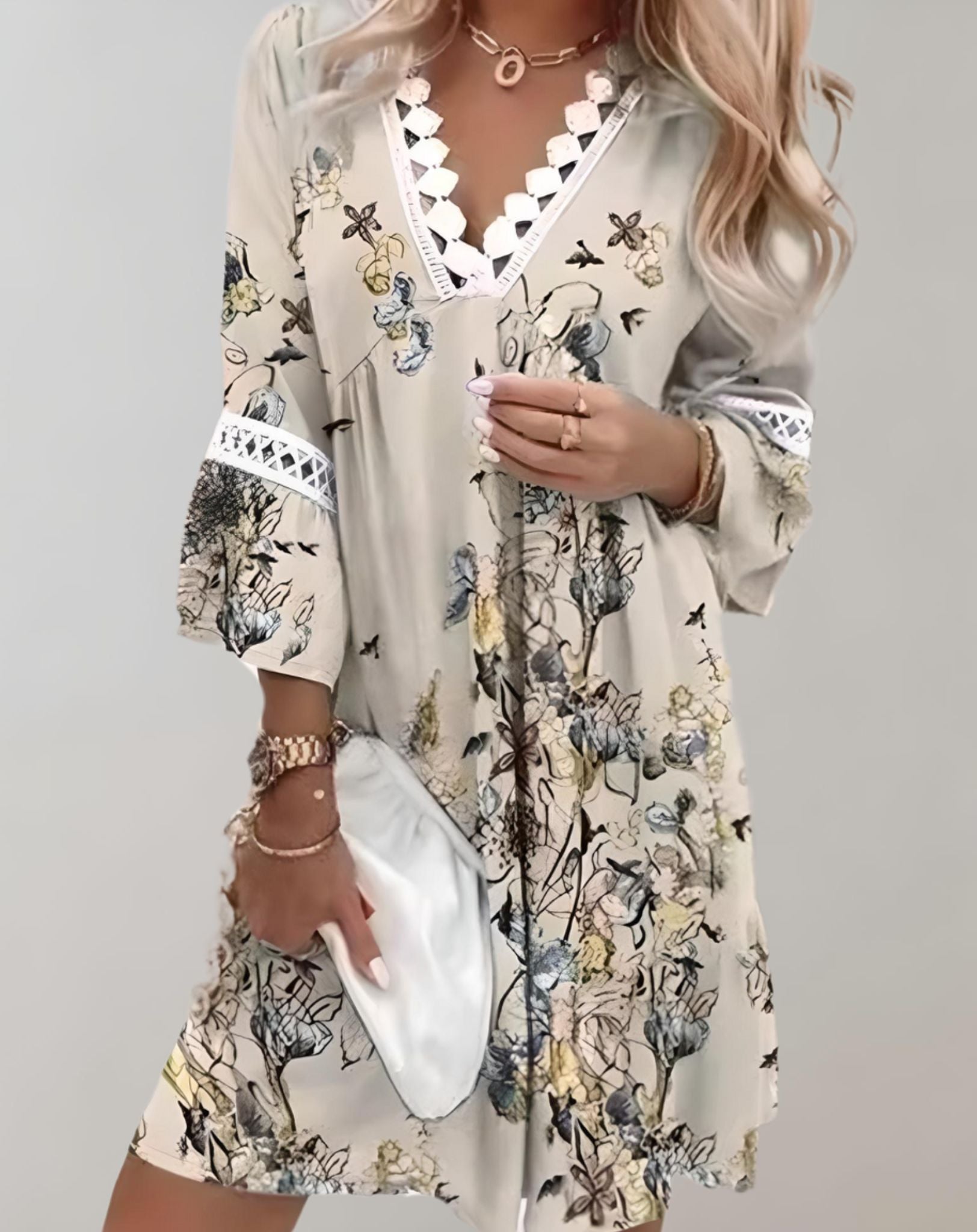 Sophie - Minikleid mit tiefem V Ausschnitt weiten langen Ärmeln und zufälligem Design Kleid